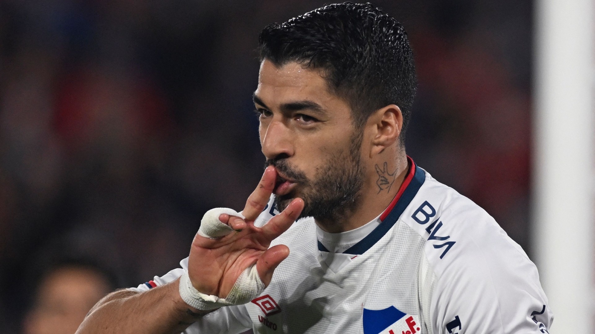 Luis Suarez kissing fingers